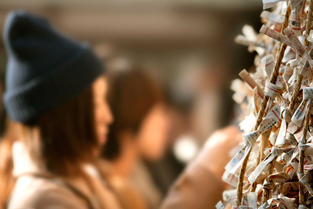 omikuji fortune slips at japanese shrine