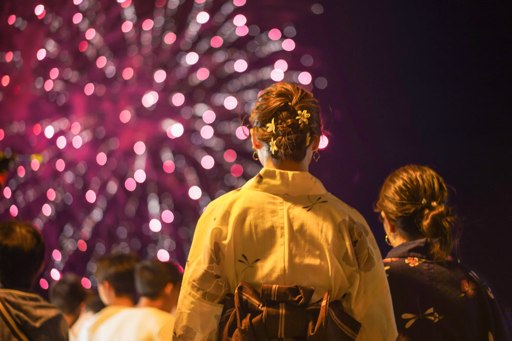 Japanese girls wearing kimono are seen viewing Fireworks in Karatsu, Saga Prefecture.